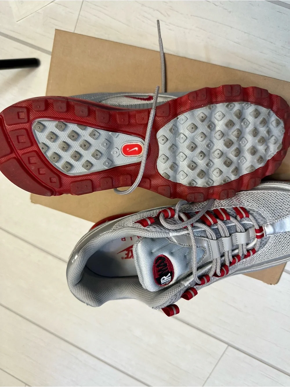 Nike Air Max 24-7 Metallic Silver with Red Accents